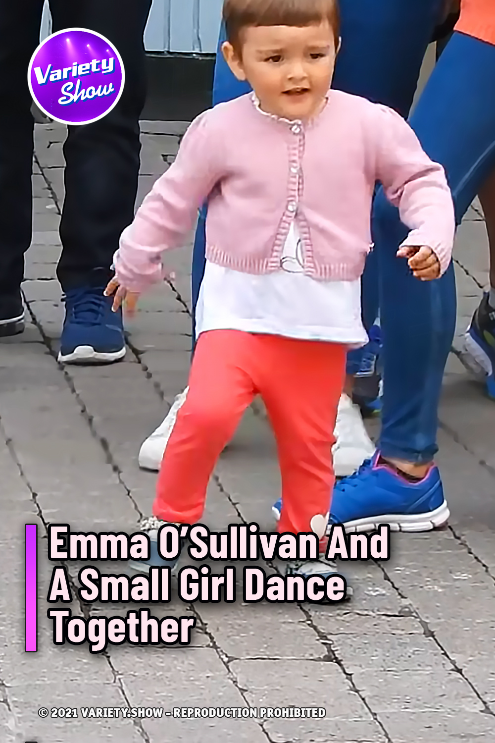 Emma O’Sullivan And A Small Girl Dance Together