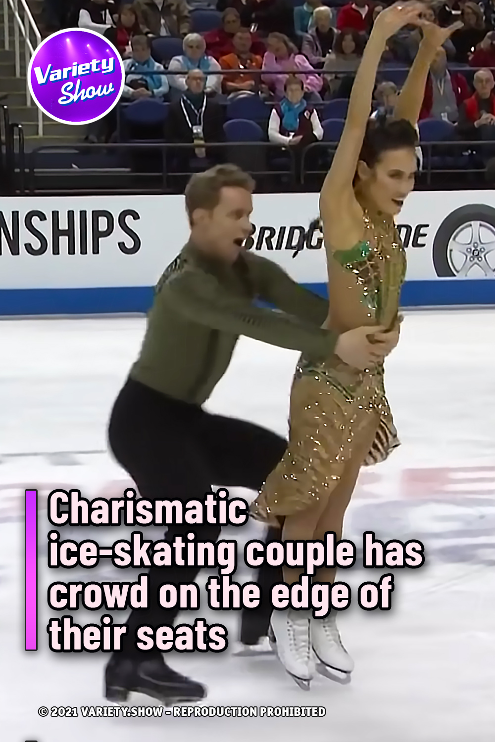 Charismatic ice-skating couple has crowd on the edge of their seats
