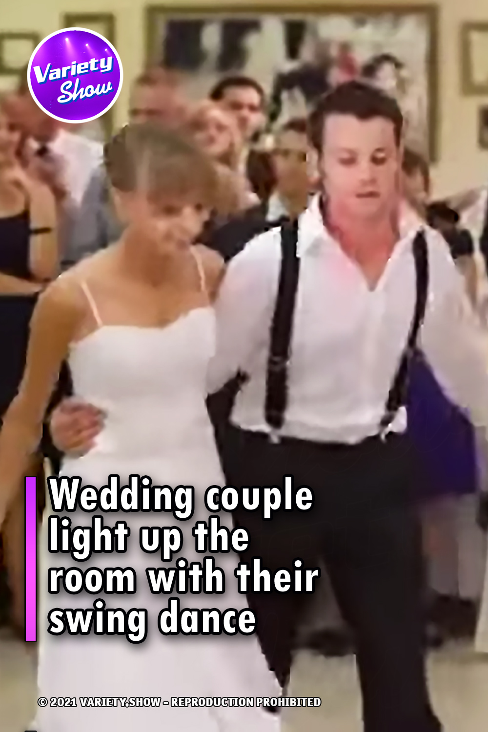 Wedding couple light up the room with their swing dance